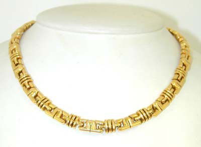 Bvlgari 18K Yellow Gold Necklace: Bvlgari 18K Yellow Gold Necklace.Weight of Necklace: 105.2 grams.The length of Necklace: 15", 6 mm wide, 2 mm thick.There is the Bvlgari stamp and 750 logo on the necklace.