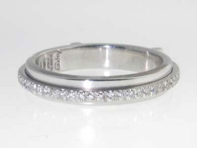 Asprey 18k White Gold Diamond Wedding band: Asprey 18K White Gold Diamond Wedding Band The total Ring's weight is 5.4 grams. Total weight of diamond: 0.75 cts, G color, VS clarity. The measurements of the Rings' face is 8mm and 4mm and 3mm thic