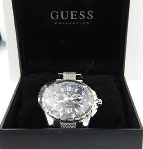 Guess Stainless Steel Chronograph Watch: Guess Stainless Steel Chronograph Watch.The total watch's weight is 188.8 grams.The measurements of the watch head is 44 x 44 mm and 10 mm in thick.The length of watch: 8.5".Chain is 21 mm wide.Water