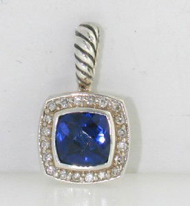 David Yurman Silver Sapphire & Diamond Pendant: David Yurman Silver Sapphire & Diamond Pendant.The total Pendant's weight is 2.9 grams.The total weight of diamonds is 0.24 cts. approximately I and SI clarity.The size of the Sapphire is 7 mm in diam