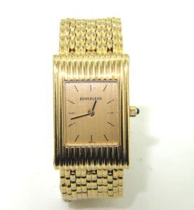 Boucheron 18K Yellow Gold Watch: Boucheron 18K Yellow Gold Watch With Pouch. The total watch's weight is 83.3 grams. The measurements of watch head is 30 x 20 mm and 4 mm thick. The length of watch: 6.75". swiss made. Water Resistant