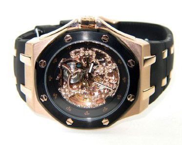 Lucien Piccard Stainless Steel Rubber Strap Watch: Lucien Piccard Stainless Steel, Rubber Strap Skeleton Watch With Box.The total watch's weight is 121.9 grams.The measurements of the watch head is 44 x 43 mm and 13 mm in thick.The length of watch: 9"