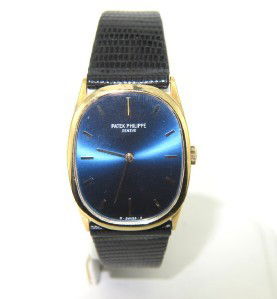 Patek Philippe Geneve Leather Strap Watch: Patek Philippe Geneve Leather Strap Watch The total watch's weight is 36.1 grams. The measurements of watch head is 30 x 27 mm and 5 mm thick. The length of watch: 6" swiss made swiss made