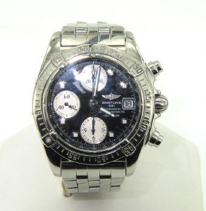 Breitling Chronograph Mens Wristwatch: Breitling Chronograph Mens Wristwatch.The total watch's weight is 164.2 grams.The measurements of watch head is 36 x 39 mm and 8 mm thick.The length of watch: 7.25".Case Type: Stainless steel.Complica
