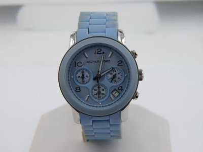 Michael Kors Stainless Steel Rubber Strap Watch: Michael Kors Stainless Steel Chronograph Rubber Strap Watch Watch's Weight: 107.1 grams The measurements of watch head: 38 x 38 mm and 12 mm in thickness The length of watch: 7" Water Resistant Swiss 