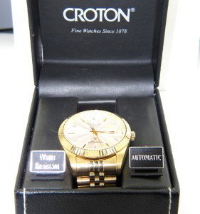 Croton Stainless Steel Skeleton Watch: Croton Stainless Steel, Skeleton Watch with Box.The total watch's weight is 125.8 grams.The measurements of the watch head is 42 mm in diameter and 13 mm in thick.Chain is 20 mm wide.The length of wat