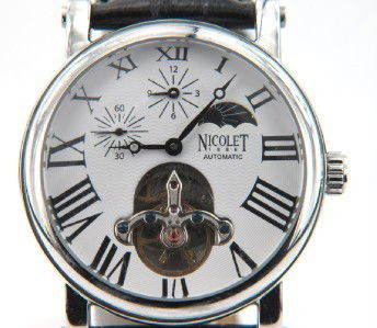 Nicolet Stainless Steel Skeleton Leather Strap Wat: Nicolet Stainless Steel, Skeleton Leather Strap Watch with Box.The total watch's weight is 74.3 grams.The measurements of the watch head is 41 mm in diameter and 14 mm in thick.Strap is 21 mm wide.The