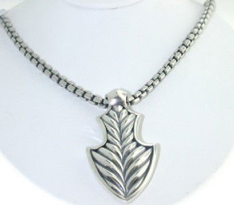 David Yurman Silver Necklace: David Yurman Silver Necklace.The total weight of Necklace is 22.2 grams.Size of pendant: 31 x 15 mm and thickness is 2 mm.The necklace is 20" long