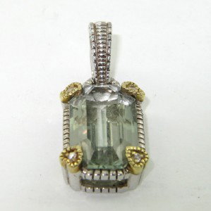 Judith Ripka Silver/18K Gold Diamond,Prasio: Judith Ripka Silver/18K Yellow Gold Diamond & Prasiolite Pendant.The total Pendant weight is 6.2 grams.The total weight of diamond: 0.08 pts. H color VS clarity.The size of prasiolite: 18 x 9 mm.Size 