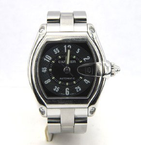 Cartier Stainless Steel Automatic Dat: Movement: Automatic Functions: Hour, Minute & Second Hands, Magnified date at 3 o'clock.Crystal: Sapphire.Caseback: Solid, with Cartier Roadster engraving and serial number.Bezel Material: Stainless S
