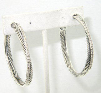 David Yurman Silver Diamond Earrings: David Yurman Silver Diamond Earrings.The total earring's weight is 17 grams.The total weight of diamond: 0.5 cts. I color SI clarity.The size of the earring is 32 x 33 mm.Earring is 4 mm wide and 2 mm