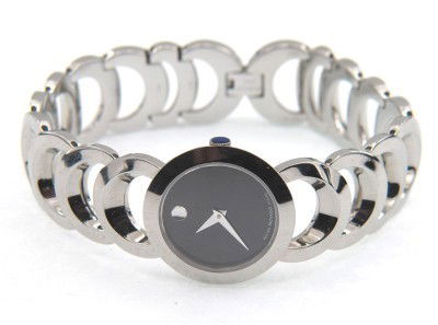 Movado Stainless Steel Watch: Movado Stainless Steel Watch.The total watch's weight is 54.8 grams.The measurements of the watch head is 18 x 24 mm and 4 mm thick.The length of watch: 7.25".Swiss Made.Water Resistant.Chain is 17 mm