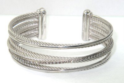 David Yurman Silver Diamond Bangle: David Yurman silver Diamond Bangle.Bangle's Weight : 52 grams.The weight of diamond: 0.75 cts, I color,SI clarity.The measurements of the Inside Bangle is 51 x 44 mm.The bangle is 18 mm wide and 2 mm 