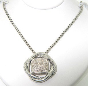 David Yurman Silver & Diamond Necklace: David Yurman Silver & Diamond Necklace.The total weight of Necklace is 12.9 grams.The total weight of diamond: 0.76 cts. I color SI clarity.Size of pendant: 19 x 19 mm. 3 mm in thickness.The necklace 