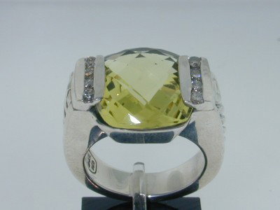 David Yurman Silver, Lemon Citrine & Diamond Ring: David Yurman Silver, Lemon Citrine & Diamond Ring.The total ring's weight is 12.2 grams.The Total Diamond weight is 16 pts approxmiately, I color SI clarity.The size of Lemon Citrine is 14 x 12 mm.The