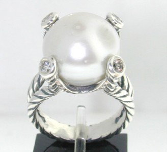 David Yurman Silver Pearl Diamond Ring.: David Yurman Silver, Pearl & Diamond Ring.The total ring's weight is 9.8 grams.The total weight of the diamonds: 0.34 approximately, I color SI clarity.The size of the Pearl is 12 mm in diameter.The s