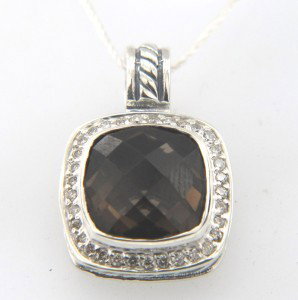 David Yurman Silver Smoky Topaz & Diamond Pande: David Yurman Silver Smoky Topaz with Diamonds Pendant.The total Pandent's weight is 6 grams.Pandent size is 23 x 16 mm, 9 mm thick.The size of Smoky Topaz is 11 x 12mm.The total diamond weight is 30 p