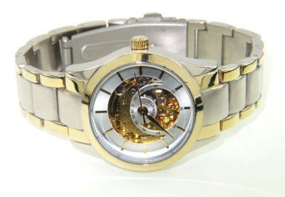 Anne Klein Stainless Steel Skeleton Automatic Watc: Anne Klein Stainless Steel Skeleton Automatic Watch.The total watch's weight is 74.9 grams.The measurements of the watch head is 28 x 28 mm and 11 mm in thick.The length of watch: 6.5".Water Resistant