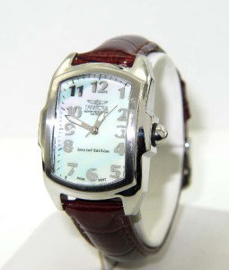 Invicta Stainless Steel Leather Strap Watch: Invicta Stainless Steel Leather Strap Watch.The total watch's weight is 50.8 grams.The measurements of watch head: 33 x 25 mm, tickness: 11 mm.The measurements of the watch is 9" long.Water Resistant.