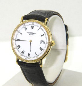 Raymond Weil Stainless Steel Leather Strap Watch: Raymond Weil Stainless Steel/Gold Plated Date Just Leather Strap Watch Watch's Weight: 26.8 grams. The measurements of watch head: 30 x 30 mm and 4 mm thick The length of watch: 8.75" Water Resistant 