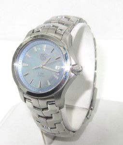 Tag Heuer Stainless Steel Date Just Women Watch: Tag Heuer Stainless Steel Date Just Women Watch The total watch's weight is 64 grams. The size of watch head: 21 x 21 mm and 8 mm thick The length of the watch is 6.5" Swiss Made Water Resistant Chain