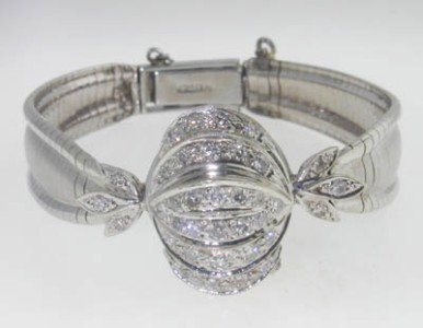 Jean Claude 14K White Gold Diamond Cover Watch: Jean Claude 14K White Gold Diamond Cover Watch.Watch's Weight :25.2 grams.Total weight of 35 diamonds: 1.4 cts, I color, VS clarity.The length of watch: 6"