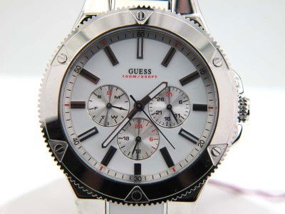 Guess Stainless Steel Chronograph Watch: Guess Stainless Steel Chronograph Watch.The total watch's weight is 156.3 grams.The measurements of the watch head is 42 x 42 mm and 9 mm in thick.The length of watch: 7.25".Chain is 19 mm wide.Water