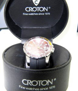 Croton Stainless Steel Rubber Strap Watch: Brand New Croton Stainless Steel, Rubber Strap Watch with Box.The total watch's weight is 90.2 grams.The measurements of the watch head is 43 mm in diameter and 12 mm in thick.Strap is 20 mm wide.The