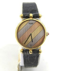 Van Cleef & Arpels 18K Gold Leather Strap Watch: Van Cleef & Arpels 18K Tri - Color Gold Leather Strap Watch.Watch's Weight: 25.1 grams.The measurements of watch head: 24 x 24 mm and 3 mm in thickness.The length of watch: 8.25".Swiss Made.Water Resi