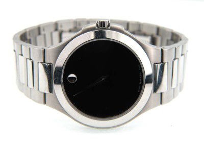 Movado Stainless Steel Watch: Movado Stainless Steel Watch With Extra Link.The total watch's weight is 135.6 grams.The measurements of the watch head is 30 x 39 mm and 7 mm thick.The length of watch: 7.75".Swiss Made.Water Resista