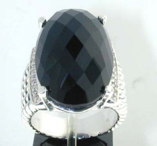 David Yurman Silver Diamond Onyx Ring: David Yurman Silver Diamond Onyx Ring.The total ring's weight is 16 grams.The total diamonds weight are approximately 0.28 cts, H-I color and VS1 clarity.The size of the Onyx is 25 x 15 mm.The size of