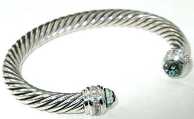 David Yurman Silver Prasolite & Diamond Bangle.: David Yurman Silver Prasolite & Diamond Bangle.The total Bangle's weight is 46.6 grams.The total diamond weight is 0.32 ct. approxmiately, H-I color SI1 clarity.The size of Prasolite : 8 mm.The measur