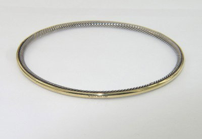 David Yurman 18k Yellow Gold & Silver Bangle!: David Yurman 18k Yellow Gold & Silver Bangle!Bangle's Weight : 11.4 grams.The measurements of the Bangle : 72 x 72 mm and the thickness is 3 mm.There is Stamp D.Y, 750, 925 on it.