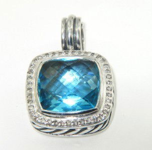 David Yurman Silver blue Topaz & Diamond Pendant: David Yurman Silver Blue Topaz & Diamond Pendant.The total Pendant's weight is 10.2 grams.The total weight of diamonds is 0.50 cts. approximately I and SI clarity.The size of the Blue Topaz is 14 x 14