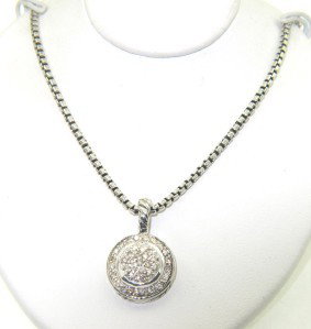 David Yurman Silver Diamond Necklace: David Yurman Silver Diamond Necklace.The total necklace's weight is 10.6 grams.The total weight of diamonds is 0.73 cts. approximately I and SI clarity.The size of the Pendant is 19 x 12 mm, Thickness