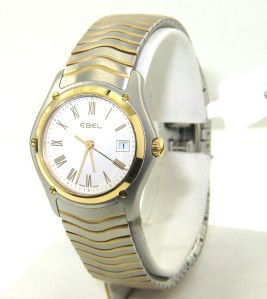 Ebel Two-Toned Stainless Steel Watch: Ebel Two-Toned Stainless Steel Watch The total watch's weight is 69.5 grams. The measurements of watch head is 27 x 25 mm and 7 mm thick. The length of watch: 8.25" swiss made Chain is 14 mm wide