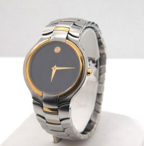 Movado Stainless Steel & Gold Plated Watch: Movado Stainless Steel & Gold Plated Watch.The total watch's weight is 110.7 grams.The measurements of the watch head is 25 x 33 mm and 5 mm thick.The length of watch: 8".Swiss Made.Water Resistant.Ch