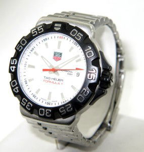 Tag Heuer Stainless Steel Professional DateJu: Tag Heuer Formula1 Stainless Steel Professional Date Just Watch.The total watch's weight is 136.2 grams.The size of watch head: 41 x 41 mm and 13 mm thick.The length of the watch is 8.25".Swiss Made.W