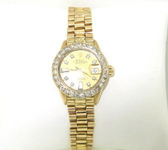 Rolex 18K Yellow Gold Diamond Watch: Rolex 18K Yellow Gold Diamond Oyster Perpetual Date Just, Sapphire Crystal Watch The total watch's weight is 63.3 grams. The total weight of diamond: 1.20 cts. H - I color VS - SI clarity The size of
