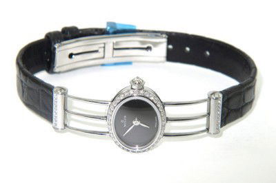 Milus Stainless Steel Diamond Leather Strap Watch: Brand New Milus Stainless Steel Diamond Leather Strap Watch With Box.The total watch's weight is 16.3 grams.The total weight of diamond: 0.46 cts. G color VVS clarity.The measurements of the watch hea