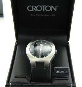 Croton Stainless Steel Rubber Strap Watch: Croton Stainless Steel Date Just Rubber Strap Watch.The total watch's weight is 69.7 grams.The measurements of the watch head is 28 mm in diameter and 9 mm in thick.The length of watch: 9.5 ".Water Re
