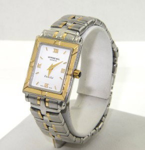 Raymond Weil 2-Toned Stainless Steel Watch: Raymond Weil 2-Toned Stainless Steel Date Just Watch.The total watch's weight is 65.9 grams.The measurements of watch head is 22 x 21 mm and 4 mm thick.The length of watch: 6.5".water Resistant.swiss 
