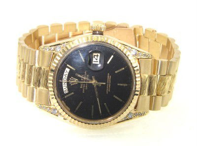 Rolex 18K Yellow Gold Day-Date Diamond Watch: Rolex 18K Yellow Gold Oyster Perpetual, Day-Date, Chronometer, Diamond, Sapphire Crystal Watch.The total watch's weight is 115.8 grams.The total weight of diamond: 0.4 cts. approximately, H color , VS