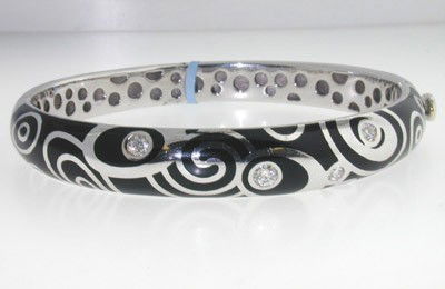 Roberto Coin 18K White Gold, Enamel & Diamond Bangle: Roberto Coin 18K White Gold, Enamel & Diamond Bangle The total weight of Bangle is 34.9 grams. The total weight of Diamond : 0.42 cts, H color and VS clarity The measurements of inside bangle: 52 x 45