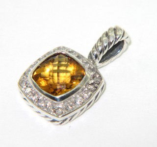 David Yurman Silver Citrine & Diamond Pendant: David Yurman Silver Citrine & Diamond Pendant The total Pendant's weight is 2.8 grams. The total weight of diamonds is 0.24 cts. approximately I and SI clarity. The size of the citrine is 7 mm in diam