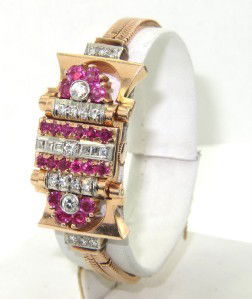 Chalet 14K Yellow Gold Diamond/Ruby Antique Watch: Chalet 14K Yellow Gold Diamond/Ruby Antique Watch From 1950 The total watch's weight is 36.3 grams The total weight of diamond: 2 cts. H color VS - SI clarity The total weigth of ruby: 2 cts The size