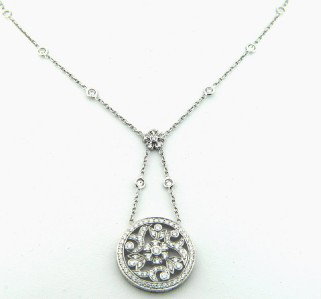 Penny Preville 18K White Gold, Diamond Necklace.: Penny Preville 18K White Gold, Diamond Necklace.The total weight of Necklace is 10.3 grams.The total weight of the Diamond: 2 cts. approximately, G color VS clarity.The size of pendant is 21 x 21 mm.T