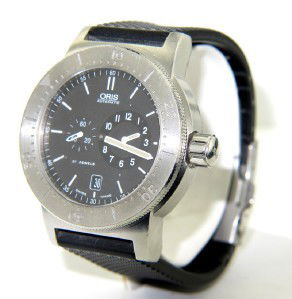 Oris Stainless Steel Rubber Strap Watch: Oris Stainless Steel Chronograph Sapphire Crystal Rubber Strap Watch.Watch's Weight: 121.6 grams.The measurements of watch head: 41 x 41 mm and 12 mm in thickness.The length of watch: 9".Strap is 22 m