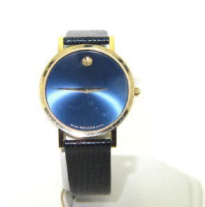Movado Yellow Gold Plated Leather Strap Watch: Movado Yellow Gold Plated Leather Strap Watch.The total watch's weight is 20.8 grams.The measurements of the watch head is 29 x 29 mm and 3 mm in thick.The length of watch: 9".Swiss Made.Water Resista