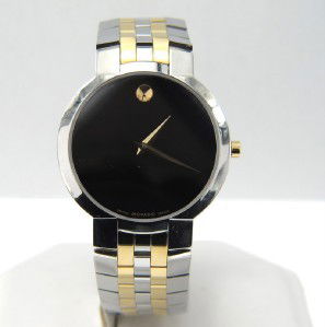 135A: Movado 2-Tone Stainless Steel Quartz Watch.: Movado 2-Tone Stainless Steel Quartz Watch With Box.The total watch's weight is 89.6 grams.The measurements of the watch head is 29 x 34 mm and 3 mm thick.The length of watch: 8".Swiss Made.Water Resi